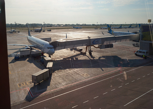 Kyiv, Ukraine - September 22, 2015: Ukraine International Airlines (UIA) Aircrafts maintenance before the flight in Kiev Boryspil International Airport (Ukraine).