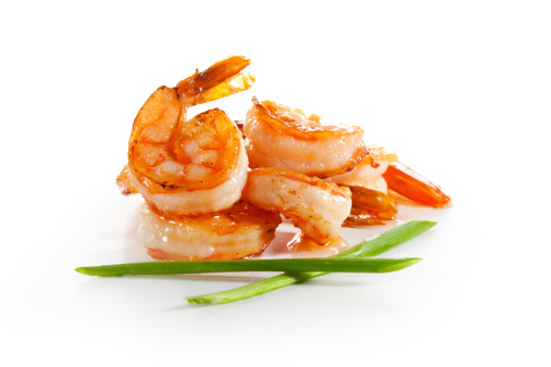 Grilled Prawns with lemon garlic butter sauce served in BBQ seafood restaurant