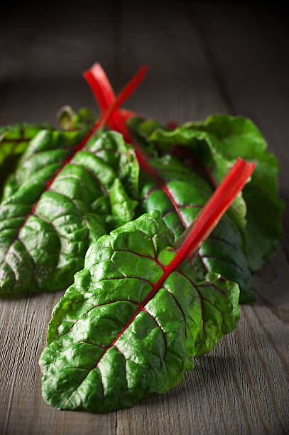 istock Swiss chard on wood 512995032