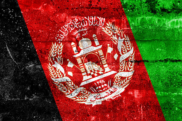 istock Afghanistan Flag painted on grunge wall 512997437