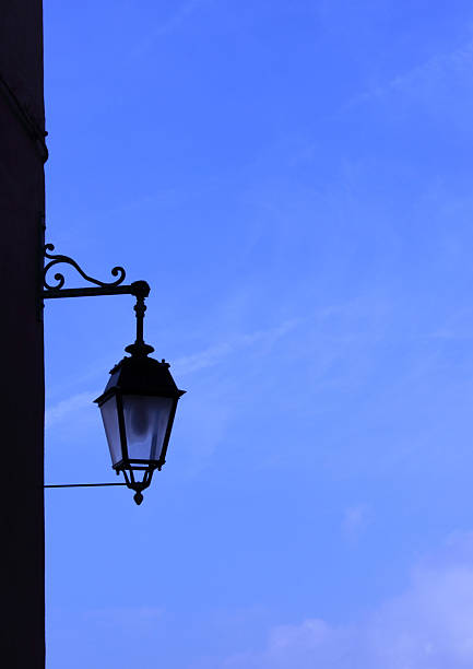 istock old street lamp in the blue sky 513000071