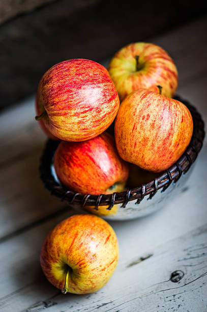 istock Apples on wooden background 513001155