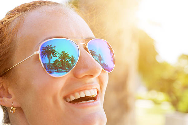 istock Palm trees reflect in the sunglasses 513001687