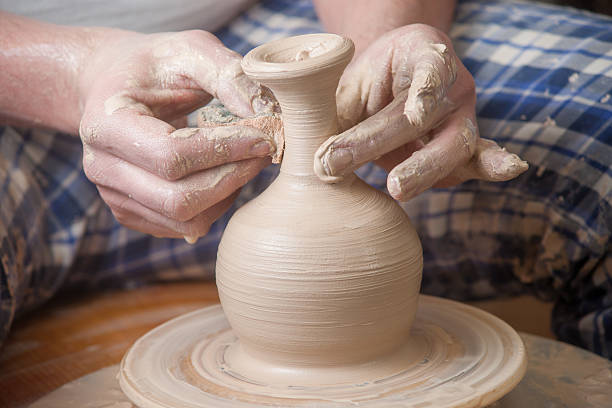 istock Hands of a potter 513002165