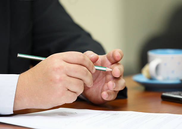 istock Young business man sitting on a desk 513020011