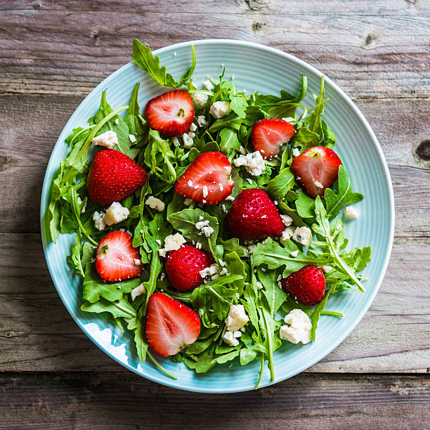 istock Salad with arugula,strawberries and cheese 513022379