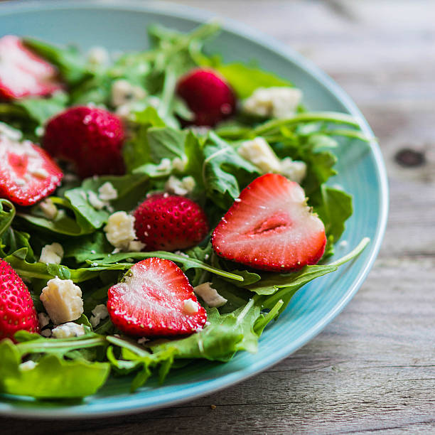 istock Salad with arugula,strawberries and cheese 513022385