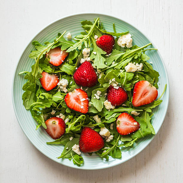istock Salad with arugula,strawberries and cheese 513022395