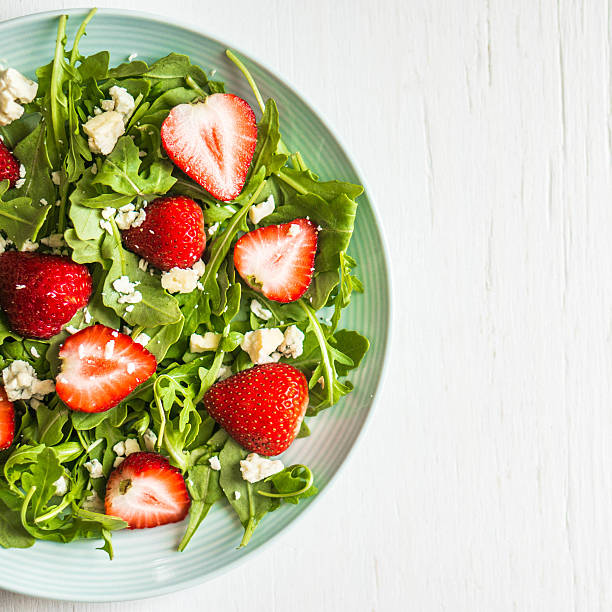 istock Salad with arugula,strawberries and cheese 513022401