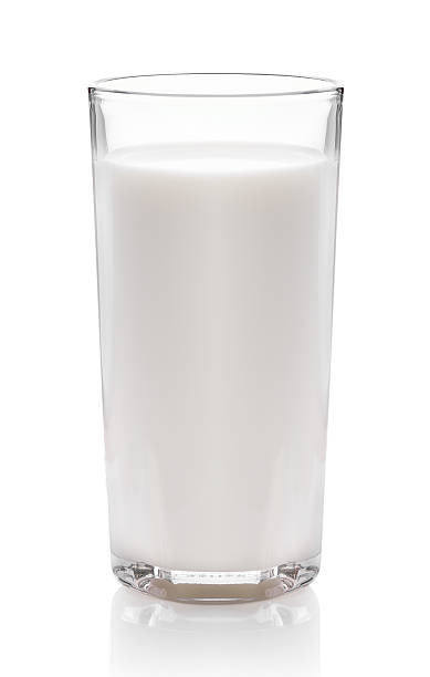 istock fresh milk in the glass on white background, isolated 513022943