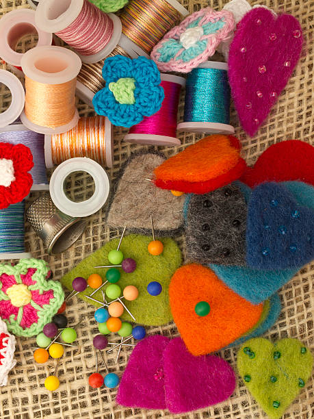 textura con material - thimble sewing item close up studio shot fotografías e imágenes de stock