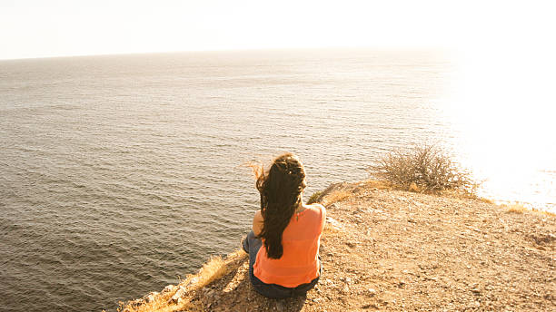 istock Woman looking at the sea 513041212
