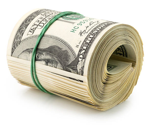 istock money roll dollars isolated on the white background 513044844