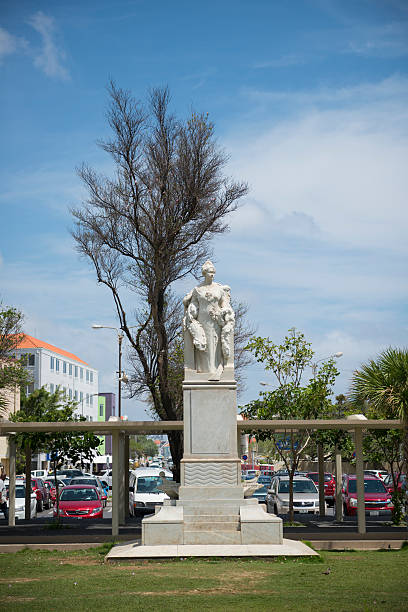 Willemstad, Curacao - September 30, 2014: A statue of Queen Wilhelmina of the Netherlands stands in a park in Willemstad, Curacao