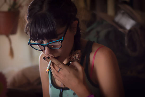 Girl smoking stock photo