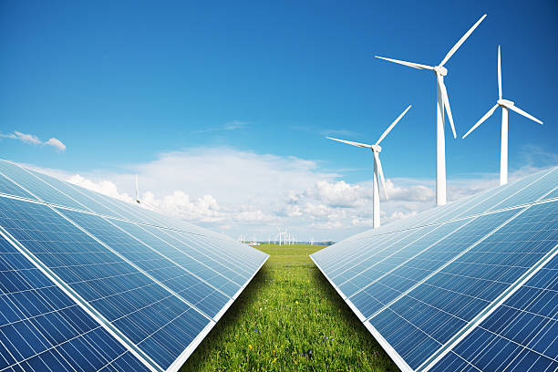 istock solar panels and windmill power plant 513049541