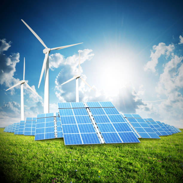 istock solar panels and windmill power plant 513049545