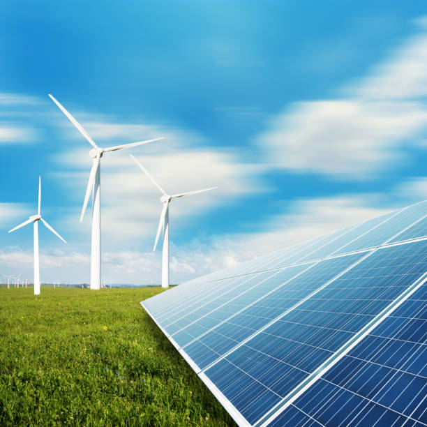 istock solar panels and windmill power plant 513049551