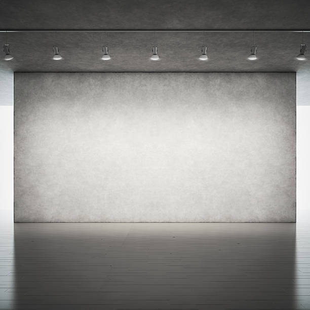 istock Wood floor and concrete wall with spotlights 513049979