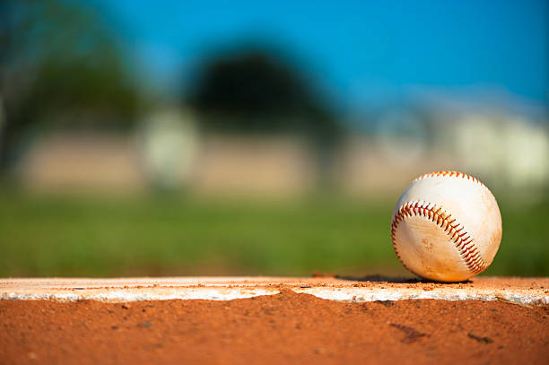 istock Little League Baseball on Pitching Mound Close Up 513050168
