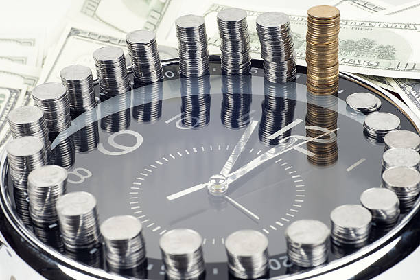 time is money and wealth stock photo