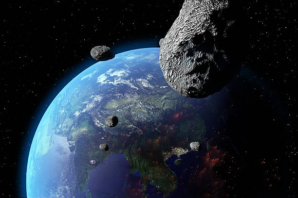 Asteroid Nears Earth An illustration of asteroids approaching Earth. Earth land and clouds texture maps courtesy of NASA.gov asteroid stock pictures, royalty-free photos & images