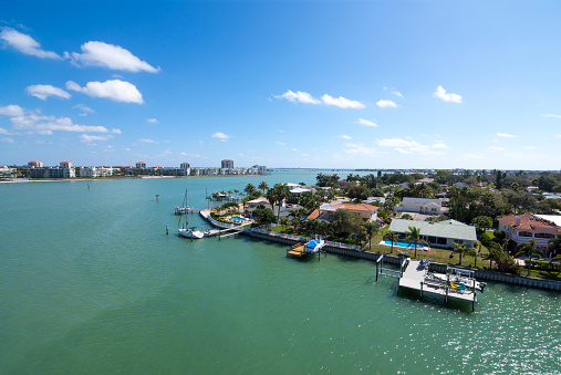 Wide angle overlooking beautiful aqua green water of Pass-a-Grille channel and islands of Isla del Sol and Vina del Mar on the gulf coast of Florida on sunny day