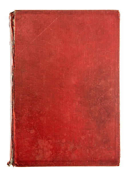istock Vintage red textile book cover isolated on white 513059078