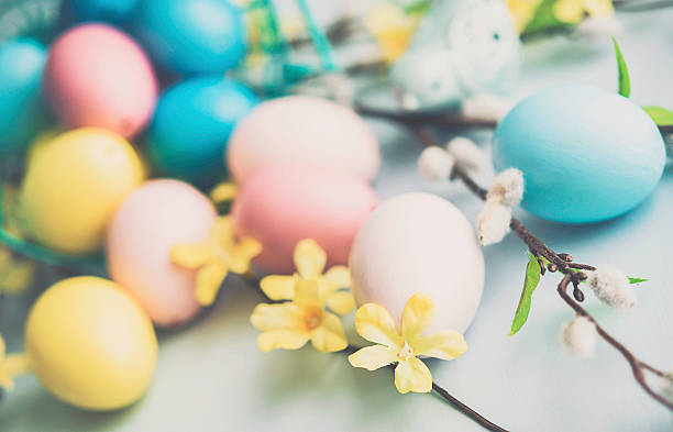 istock Easter arrangement with painted eggs, blossoms and pussy willow 513061234