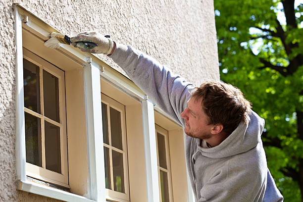 istock House Painter Working on Exterior Home Maintenance Improvement Painting Work 513063028