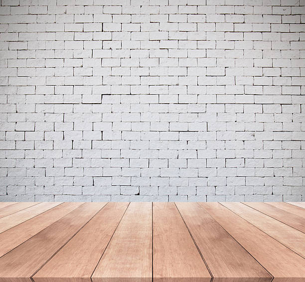 istock wooden floor and white brick wall texture background 513064528