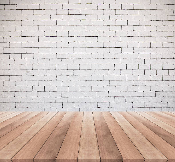 istock wooden floor and white brick wall texture background 513064530