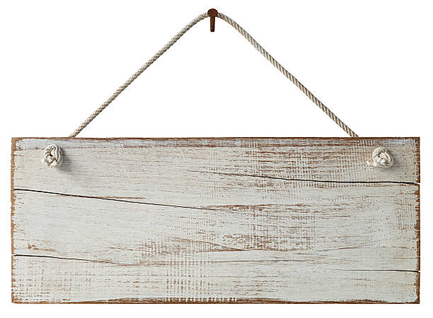 istock Old weathered white wood signboard. 513065276