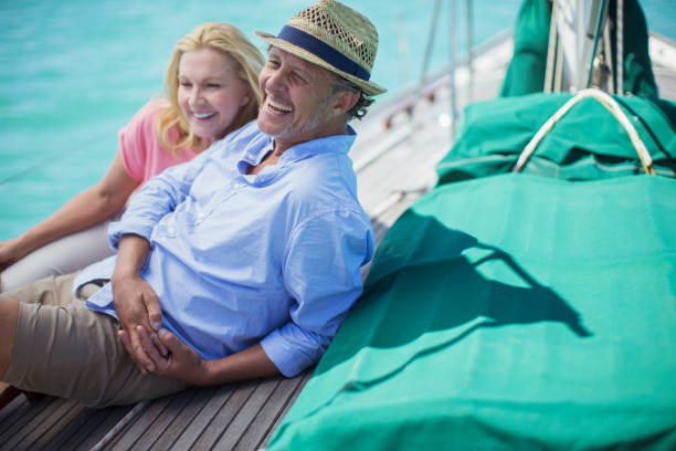 istock Couple sitting on boat together 513067073