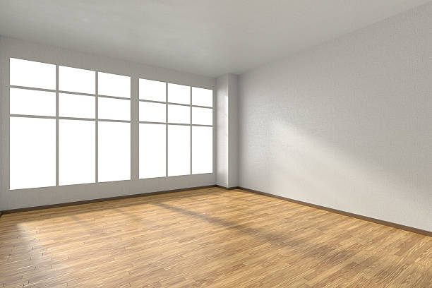 istock Empty room with parquet floor, textured white walls and window 513067404
