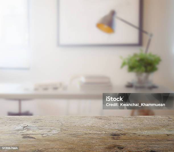 Wooden Table Top With Blur Of Modern Working Table Stock Photo - Download Image Now - Table, Defocused, Home Office