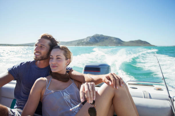 istock Couple sitting on boat together 513067709