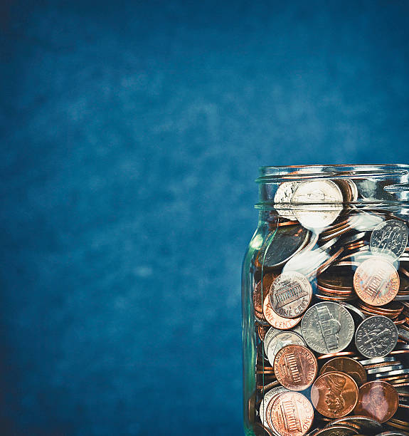 istock Money jar filled with American currency 513068658