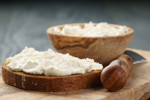 istock rye bread with cream cheese on wood table 513069638