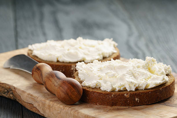 istock rye bread with cream cheese on wood table 513069648