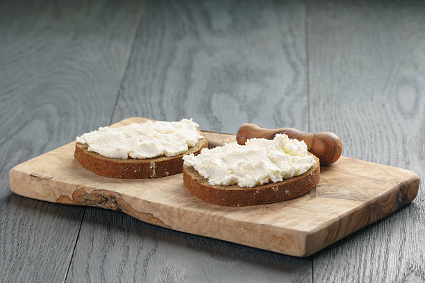 istock rye bread with cream cheese on wood table 513069668