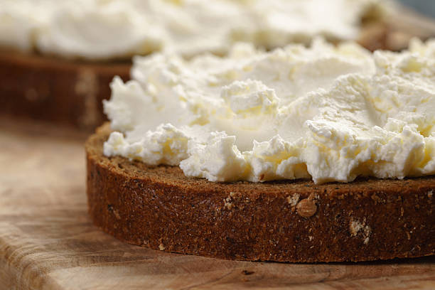 istock rye bread with cream cheese on wood table 513069718