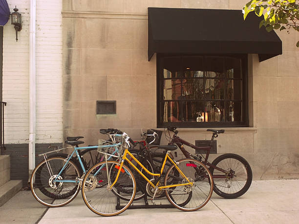 istock Bikes on Rack in front of Building With Black Awning 513070551