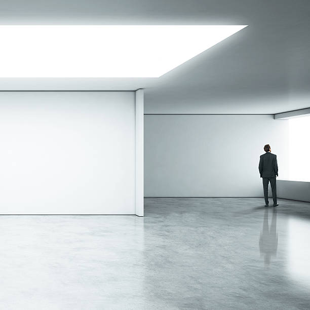 istock Businessman standing in white office 513071217
