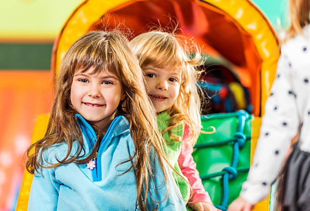 istock Little girls in a playroom. 513071601