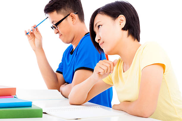 istock young student girl thinking in class with classmates 513072305