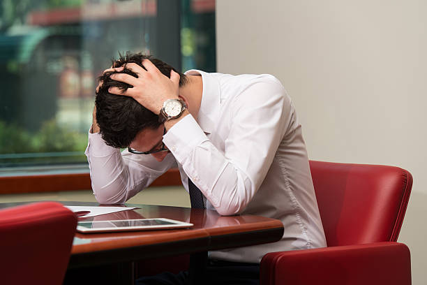 istock Desperate Manager Holding Hands On His Head 513072339