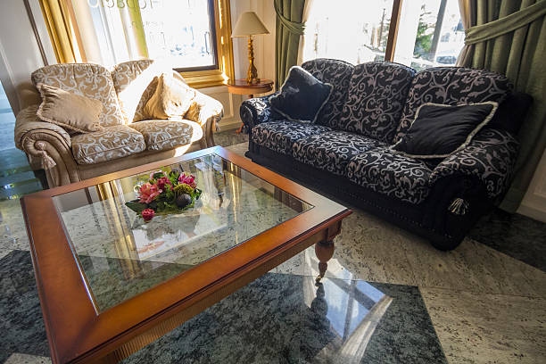 istock elegant antique sofas, glass table with flowers and relaxing 513072363