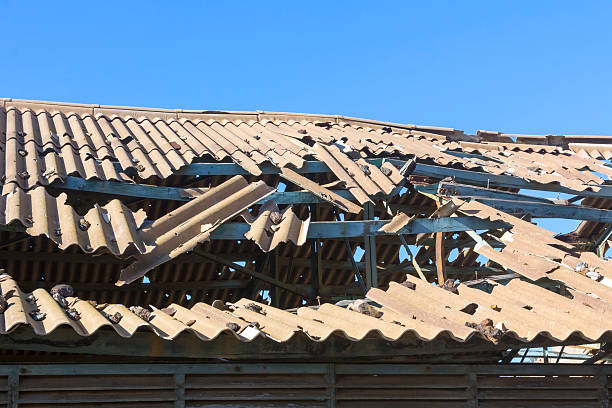 broken and destroyed roof of an old abandoned industry stock photo