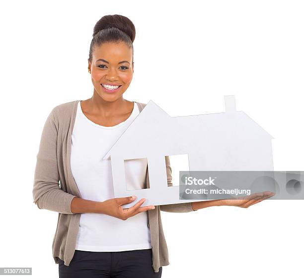 Black Woman Holding Paper House Stock Photo - Download Image Now - African Ethnicity, Women, Cut Out